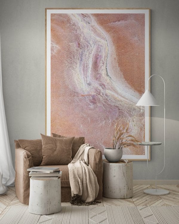 Extraordinary-experiences-comfy-warm-living-room-with-large-armchair-pink-salt-abstract-artwork-large